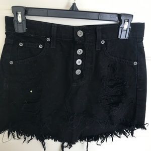 Black distressed denim skirt