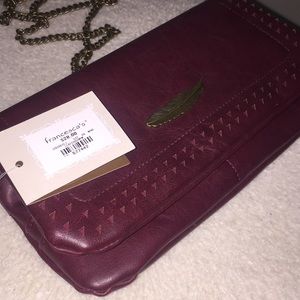 Burgundy clutch with gold chain, tag on!