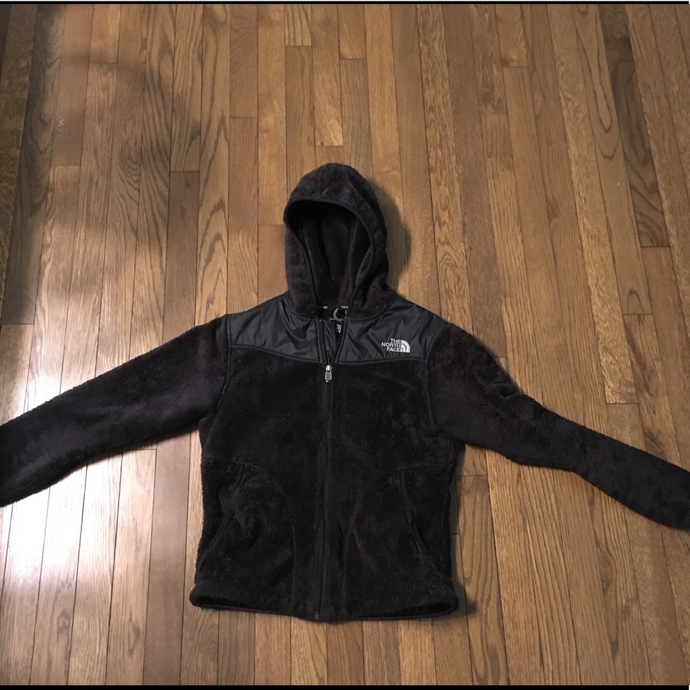 Black fuzzy fleece North Face jacket with hood