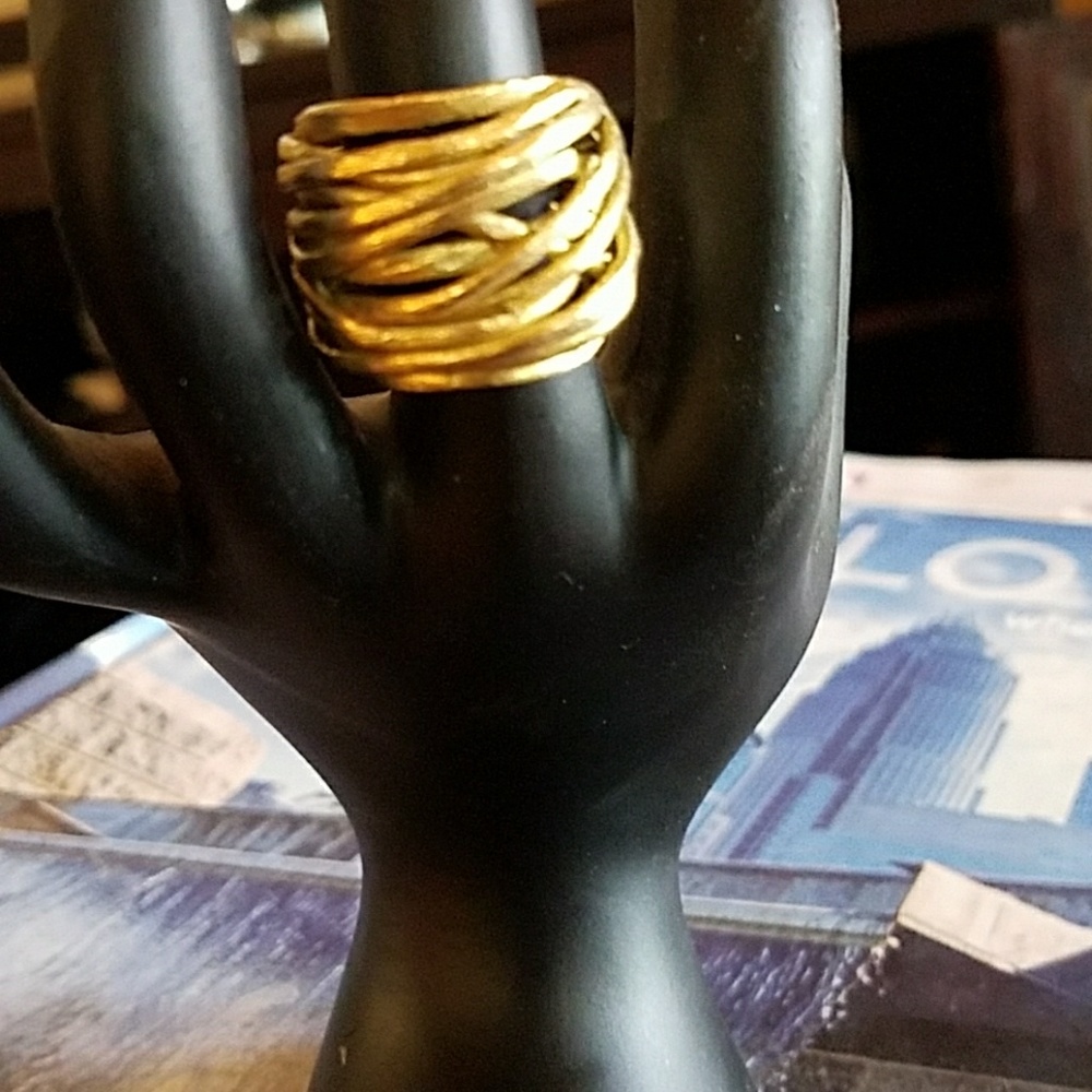 Gold ring .  Artistic.  Abstract.  Cool looking.