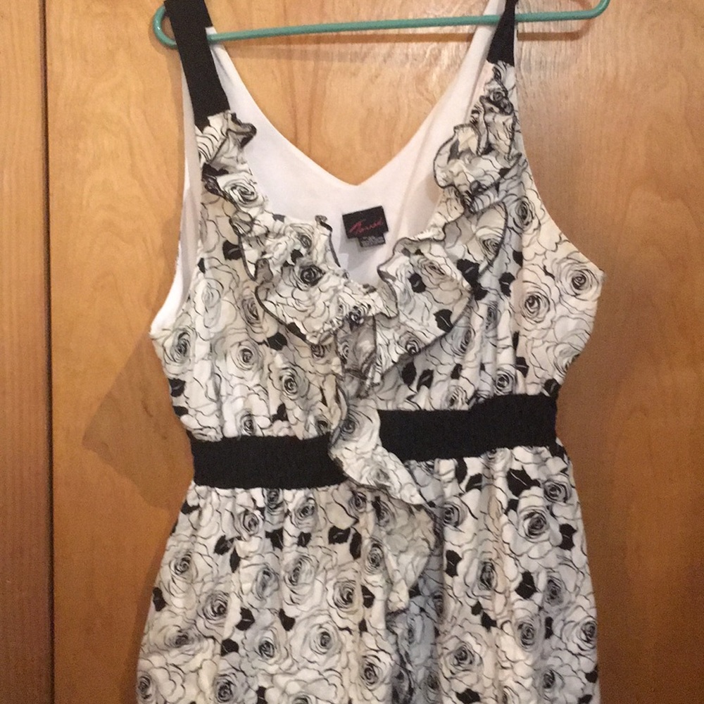 Black and white ruffled floral shirt
