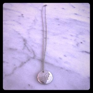 Tiffany & Co. Notes letter "A" round pendant