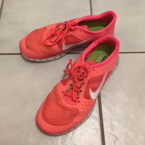 Nike Free neon pink athletic shoes