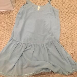 Never worn spaghetti strap blouse with lace detail