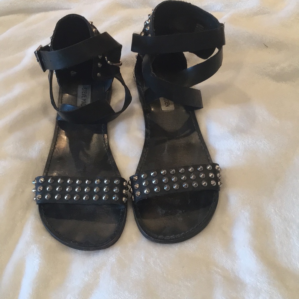 Studded black Steve Madden gladiator sandals.