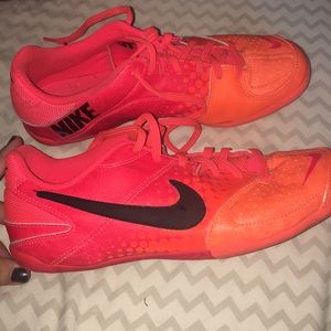 Nike neon orange athletic shoes