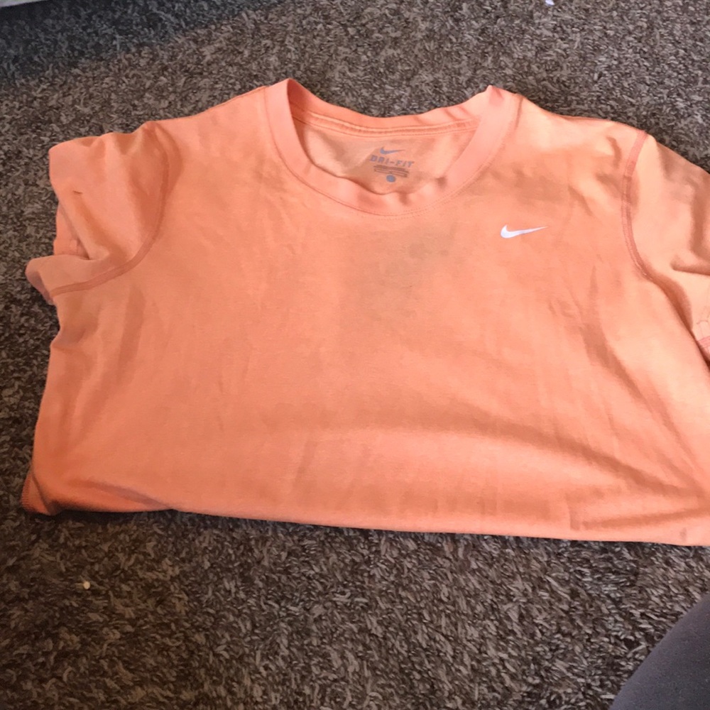 Orange Nike shirt
