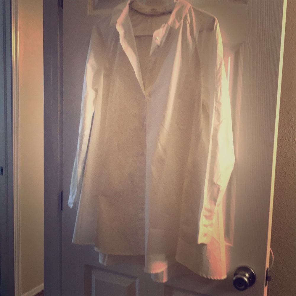 White collared shirt/dress, super flowy at bottom