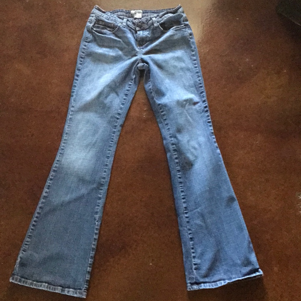 SO wear it declare it. Med wash boot cut jeans 7.