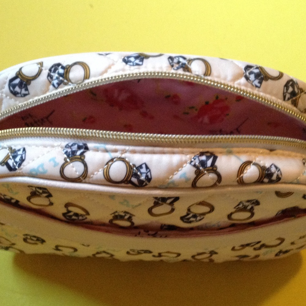 Betsey Johnson make-up bag.