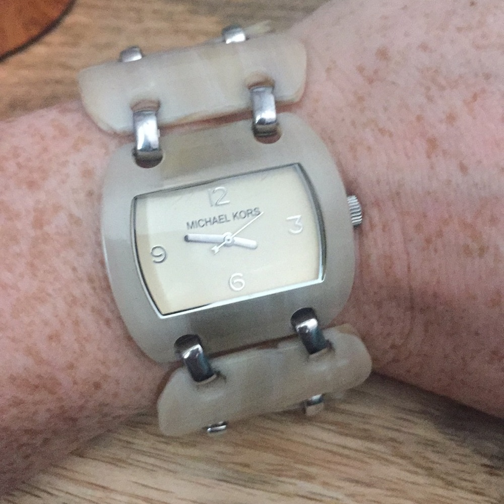 Michael Kors shell watch.