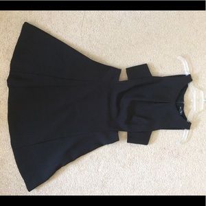 Sleeveless skater cocktail dress with cut outs