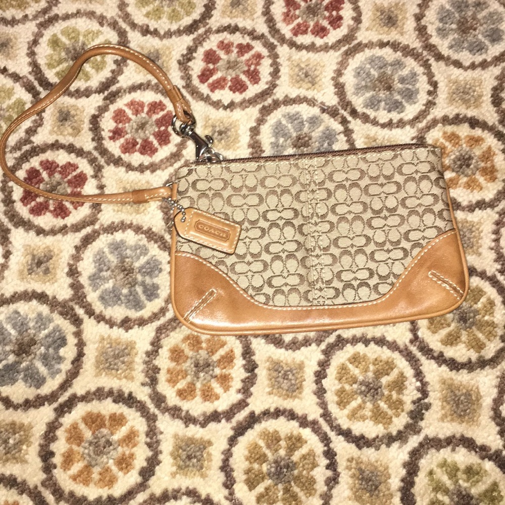 Cognac brown Coach logo wristlet