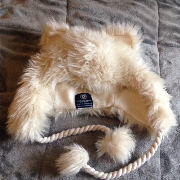 American Eagle Outfitters Accessories - American Eagle fuzzy hat with ears and bobbles.
