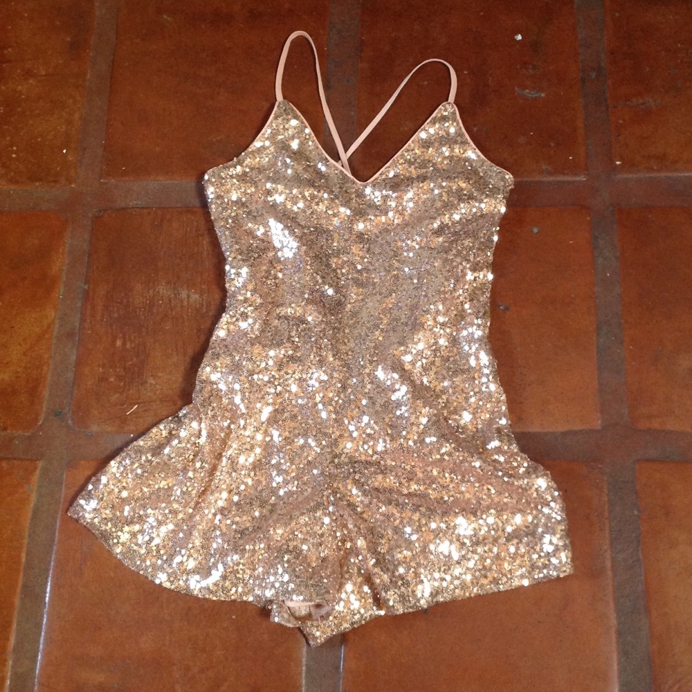 NWT.  Sequin short romper, size M