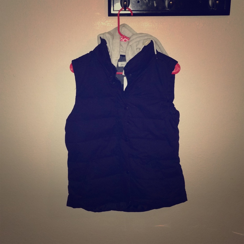 Vest with hood