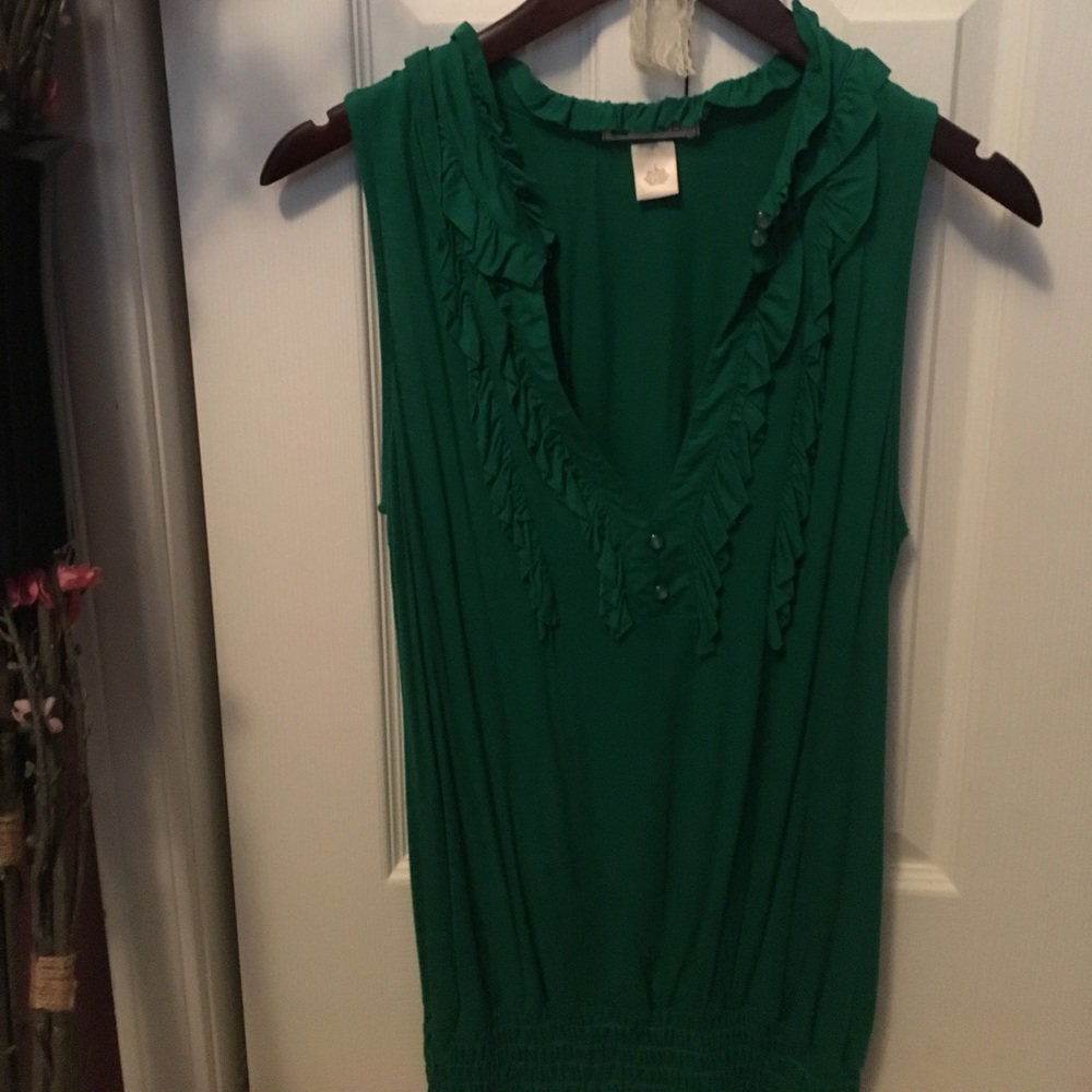 Arden B: green blouse buttons on top