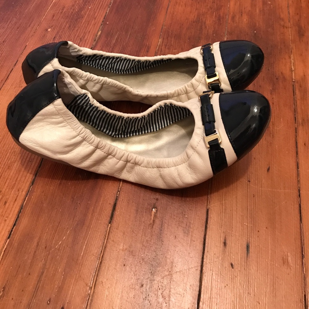 Cream and navy blue leather flats w/gold hardware
