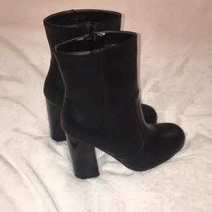 Black heeled booties.