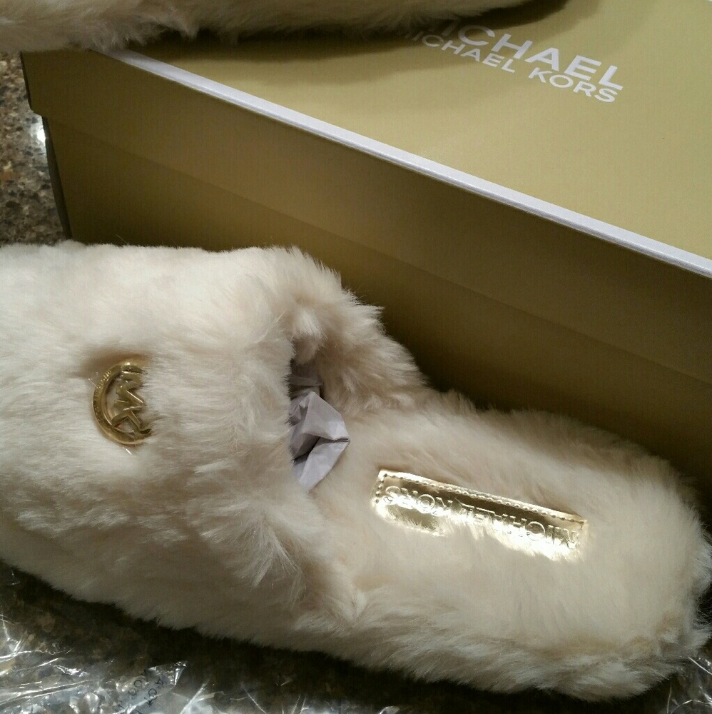 NWT Authentic  Michael kors off white slippers.