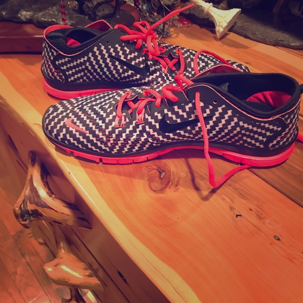 Size 12 women's Nike 5.0 dark hot pink