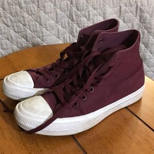 Maroon chuck Taylor II high top converse