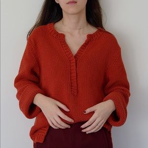 Red v-neck chunky sweater