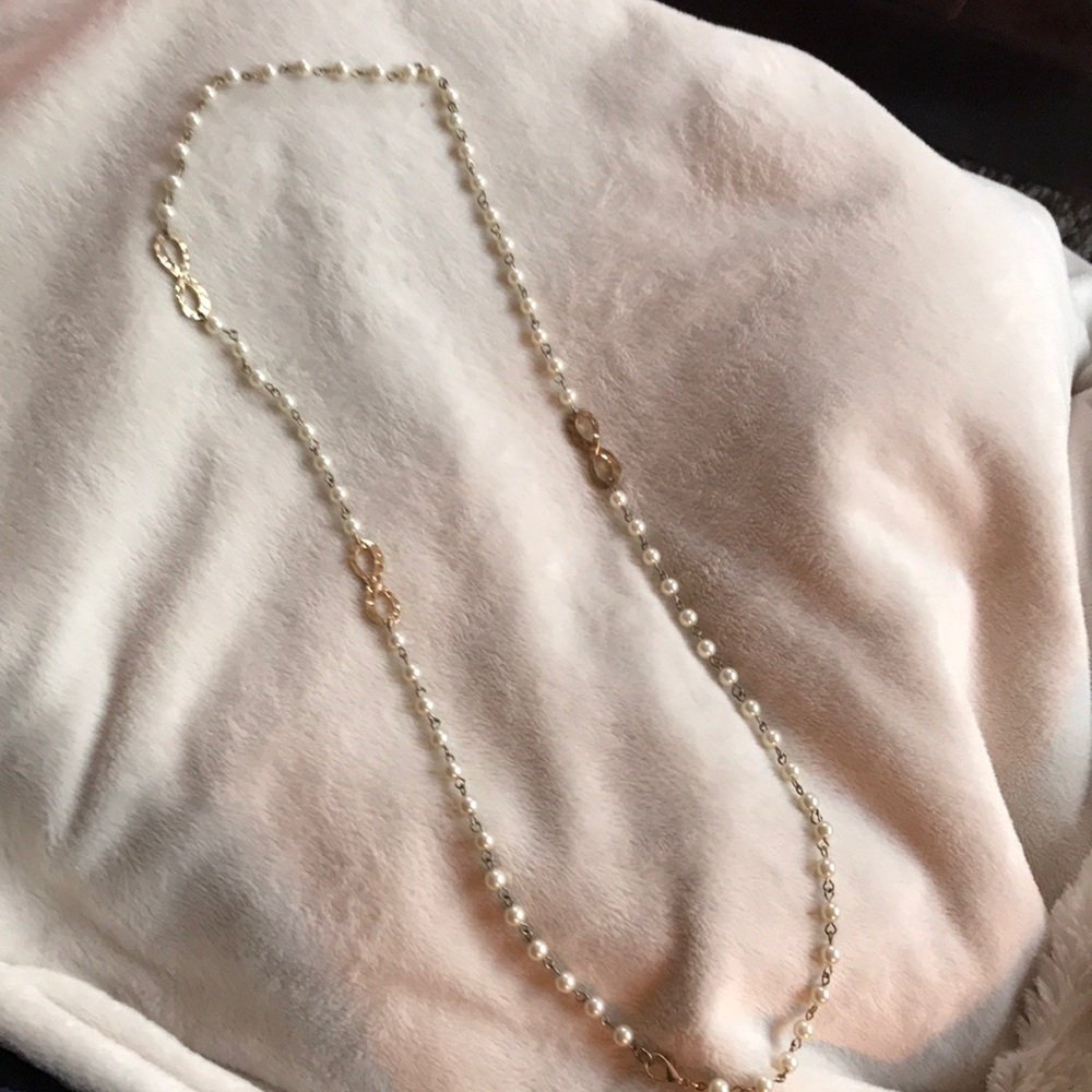 Gold and pearl infinity necklace