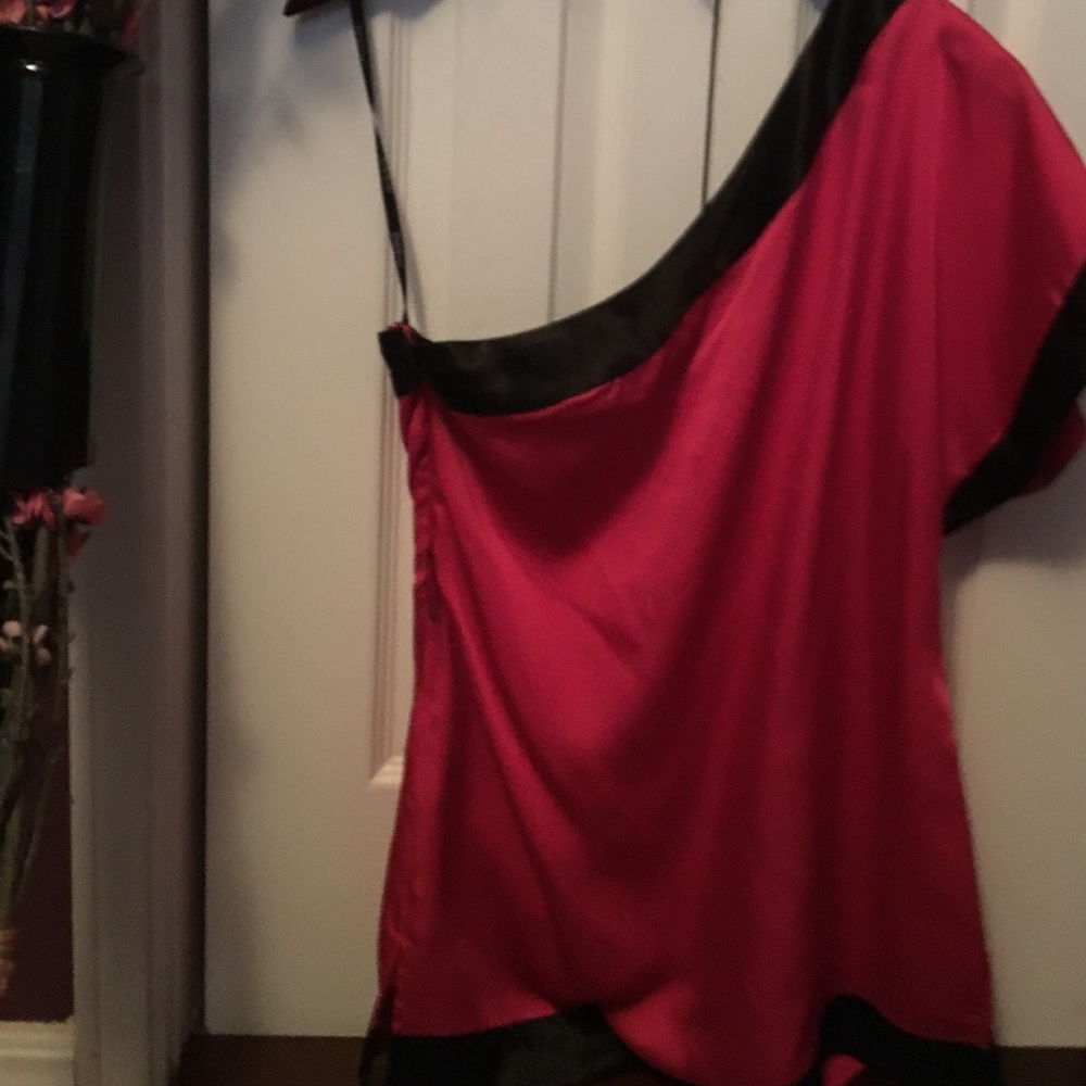 Bebe: one shoulder pink with black trim silk top