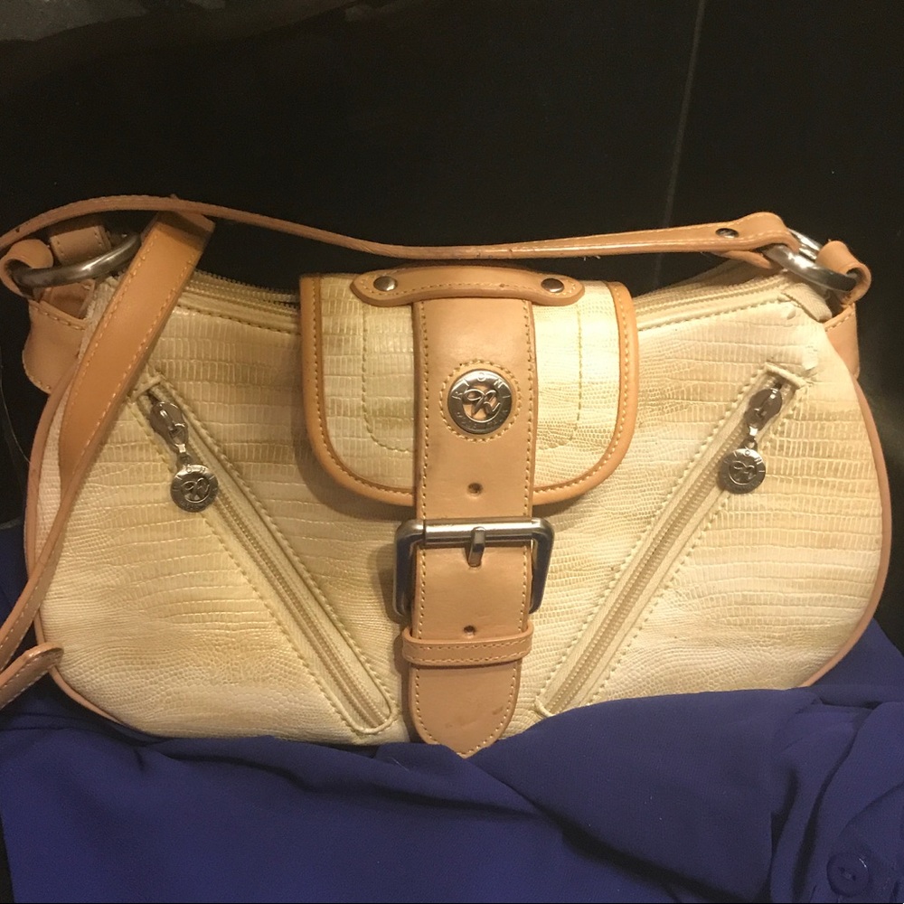Rioni authentic purse brand new never used
