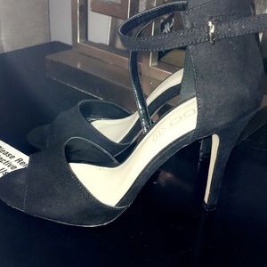 Size 9, strappy Aldo heel.