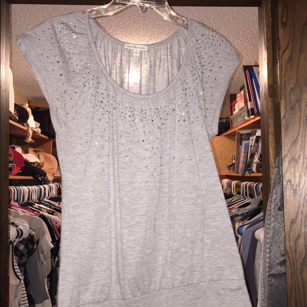 Shirt with jewels on top