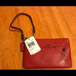 Coach x Snoopy Limited edition corner zip wristlet