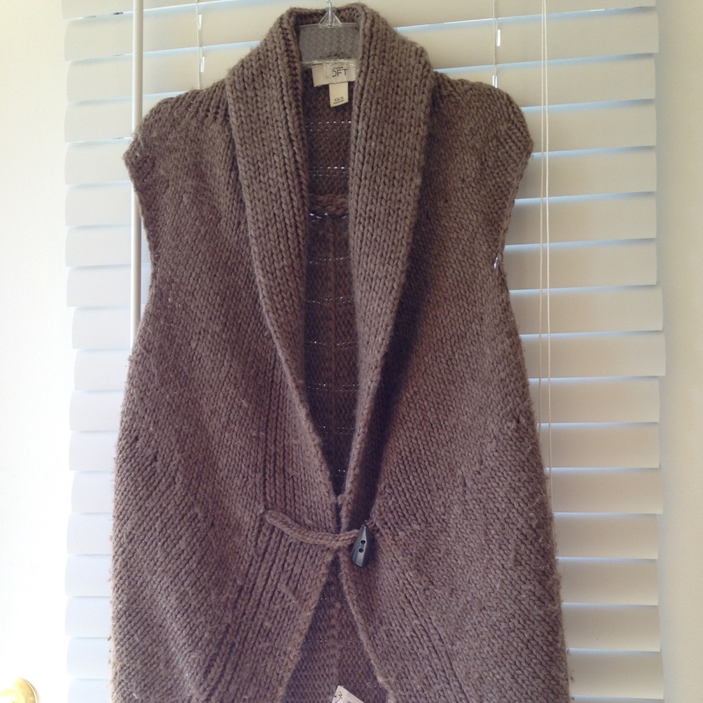 Brown sweater vest