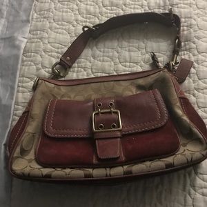 Suede accented coach bag