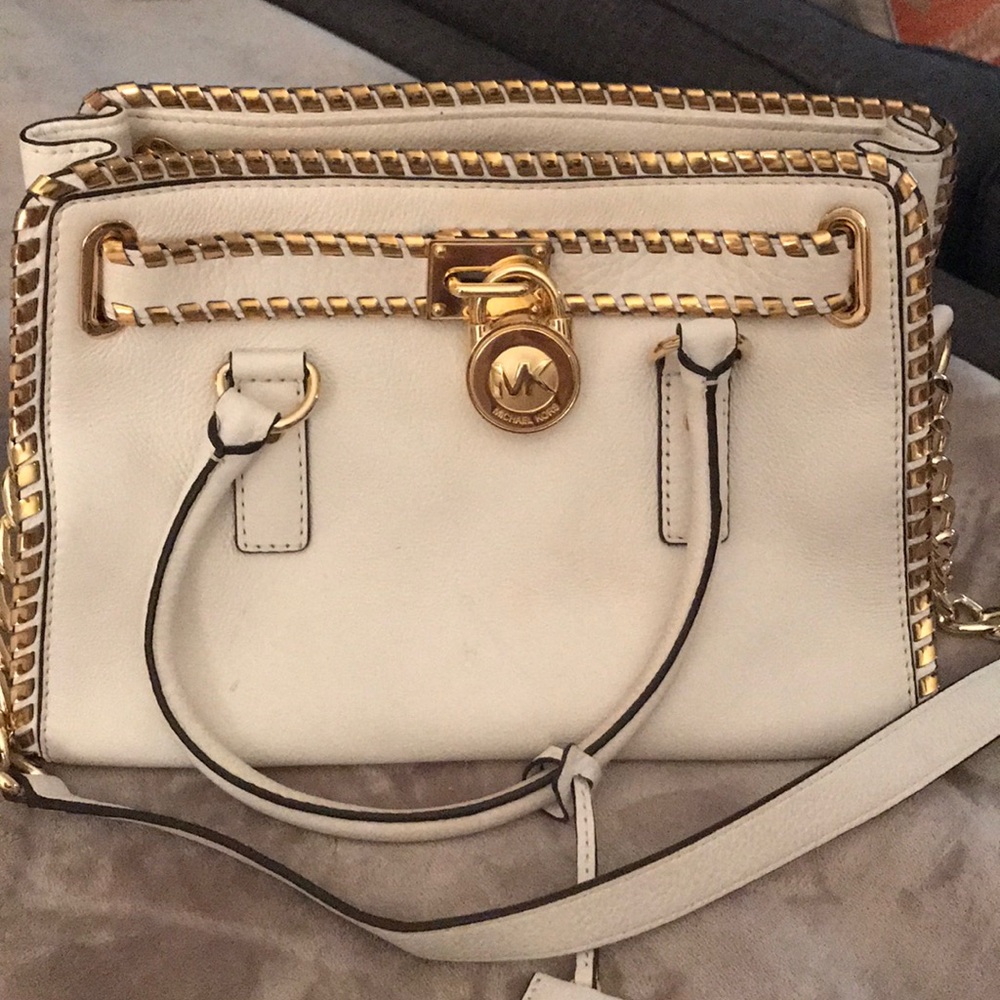 Michael Kors gold and white purse