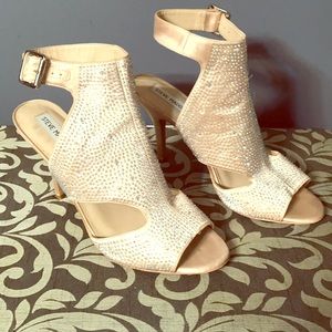 Steve Madden Heel with ankle strap.