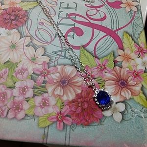 Cco Pretty solitare blue stone necklace