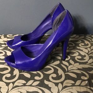 Purple patent leather heel.