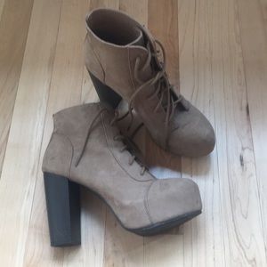 Platform lace up booties.