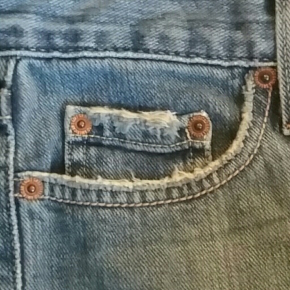Slightly distressed jeans - Picture 3 of 4