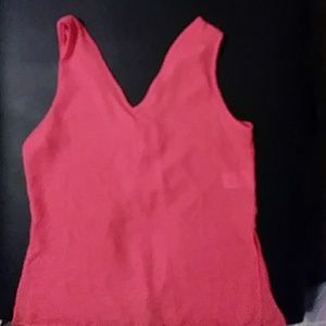Bright orange/pink lace up back top