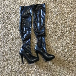 Over the knee black boots