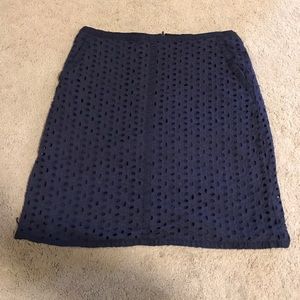 Navy Skirt with eyelet design and front pockets