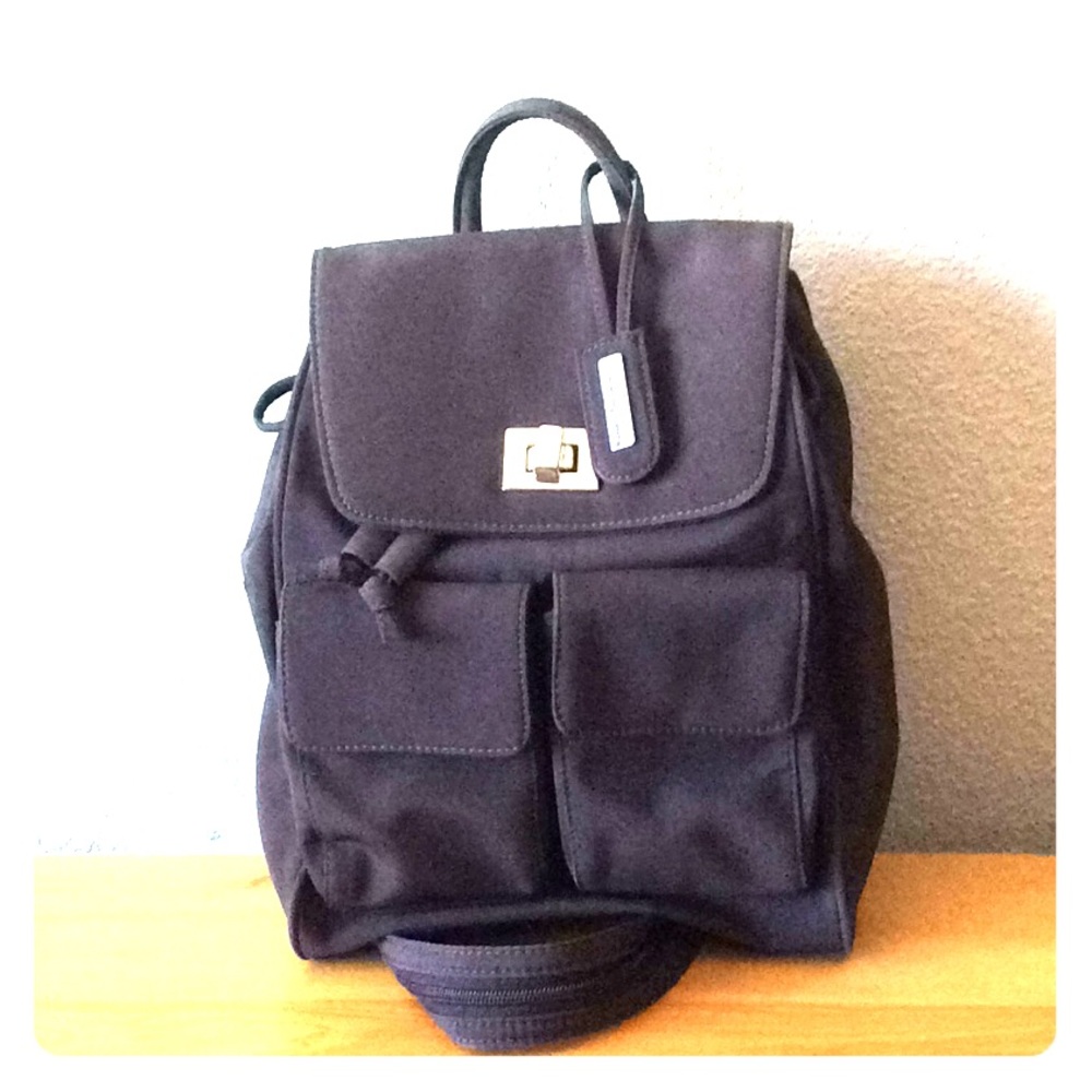 INC brand backpack purse.
