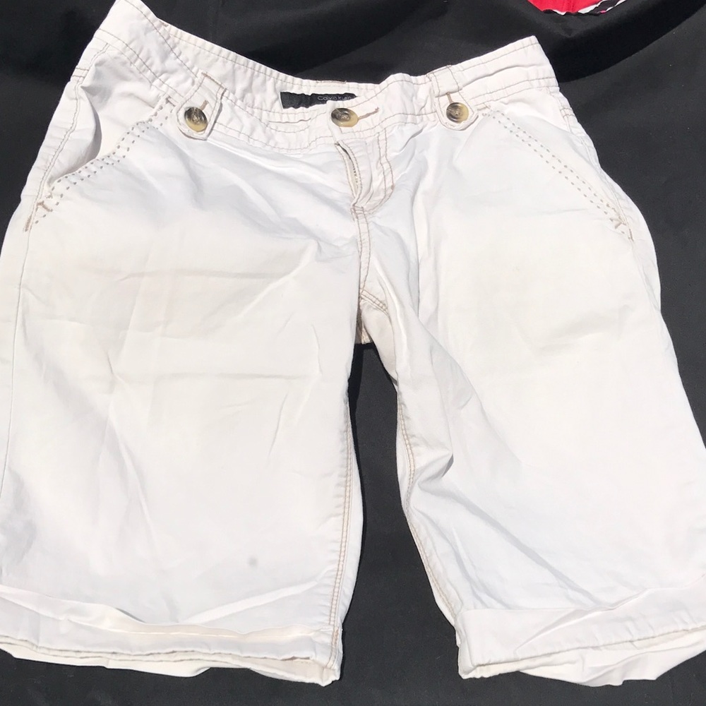 Calvin Klein khaki Bermuda shorts.W-26 L-19