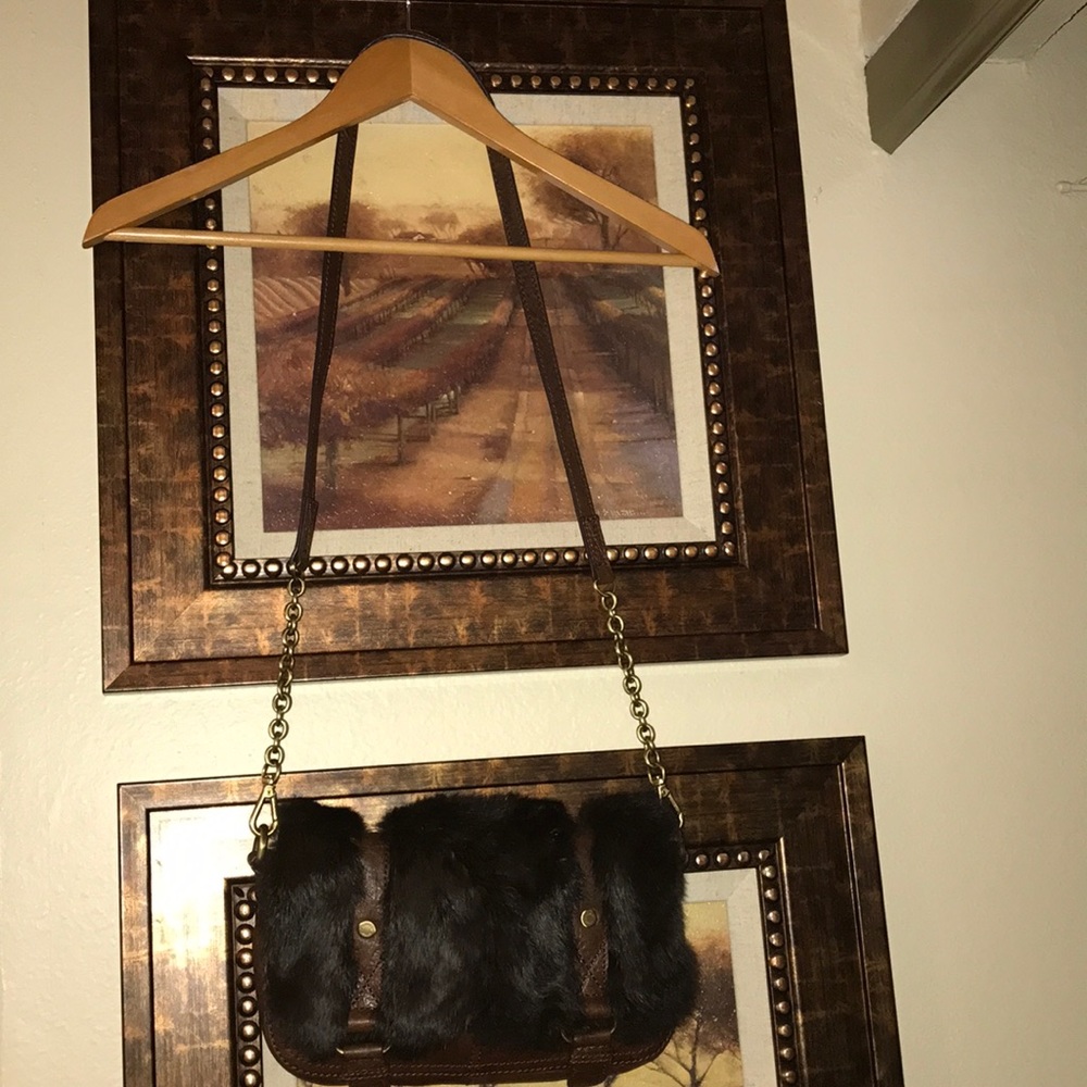 Andrew Marc brown fur shoulder bag.