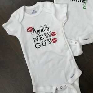 New with tags 6/9 month onsies