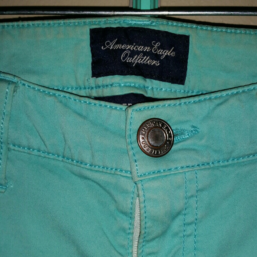 American Eagle teal skinnys