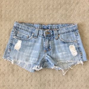 Light distressed cut off shorts